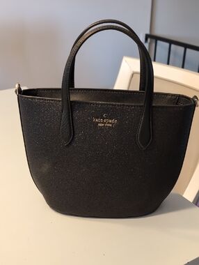 kate spade black glitter mini tote with gold logo